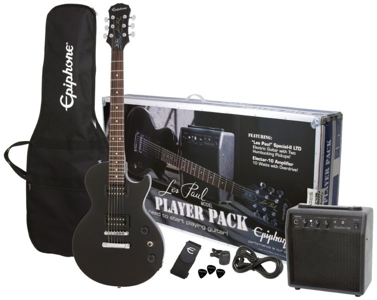 Kit med elgitarr förstärkare och strängar